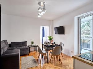 Posedenie v ubytovaní Villa Łeba II - Loft Apartments + 37 fotografií