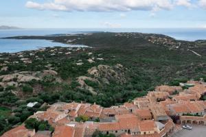 an aerial view of a village on a mountain at Casa Isidora by Wonderful Italy in Arzachena