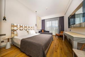 Jiva Beach Resort - Ultra All Inclusive客房内的一张或多张床位
