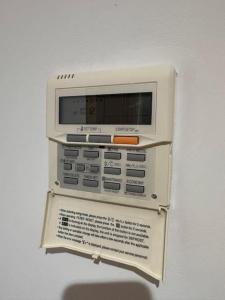 a microwave oven sitting on top of a wall at Piso en Gandía in Gandía