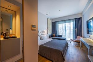 Jiva Beach Resort - Ultra All Inclusive客房内的一张或多张床位