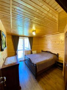 Posteľ alebo postele v izbe v ubytovaní Goretsʹ family home