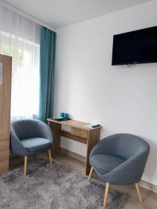 TV a/nebo společenská místnost v ubytování Hostel Mleczna - Metro Zacisze
