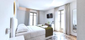 Letto o letti in una camera di Tzanis Resort Skyros