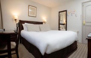 Postel nebo postele na pokoji v ubytování Teclados Hotel