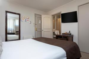 Postel nebo postele na pokoji v ubytování Teclados Hotel
