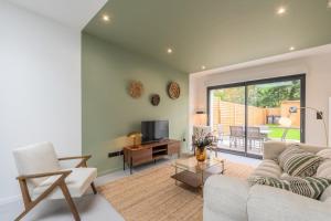 Χώρος καθιστικού στο 3 bedroom house with garden, free parking