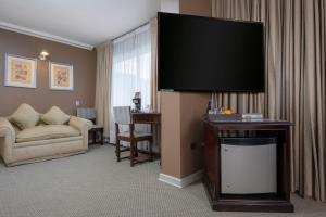TV a/nebo společenská místnost v ubytování Teclados Hotel