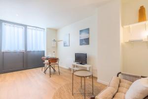 Μια τηλεόραση ή/και κέντρο ψυχαγωγίας στο Duplex apartment in the heart of Wambrechies