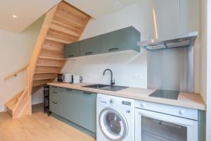 Η κουζίνα ή μικρή κουζίνα στο Duplex apartment in the heart of Wambrechies