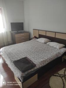 Uma cama ou camas num quarto em Vila Maria