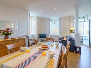 a kitchen and living room with a table and chairs at Apartment Villa La Concha-1 by Interhome in Saint-Jean-de-Luz