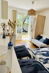 Ένα ή περισσότερα κρεβάτια σε δωμάτιο στο Holiday Home La Villa les Dunes by Interhome