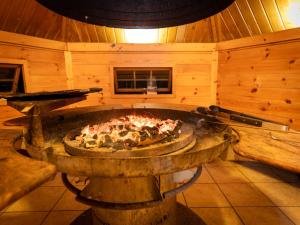 a pizza oven in a room in a cabin at Villa Craigmore Lodge by Interhome in Aviemore