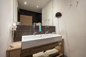 A bathroom at Hotel Sonnegg