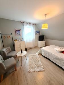 Postel nebo postele na pokoji v ubytování La Maison De Roméo