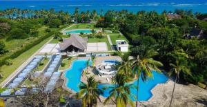 an aerial view of a resort with a swimming pool at Twilight Beach Haven in Ukunda