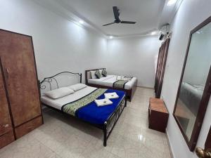 A bed or beds in a room at Kyle Calangute 1 bhk luxury apartment with pool