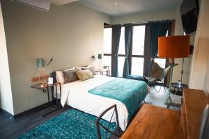 Cama o camas de una habitación en Hotel Lincoln Lounge