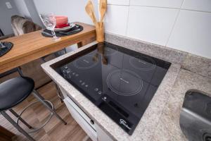 Η κουζίνα ή μικρή κουζίνα στο Osasco Piscina Climatizada Vista Estacionamento