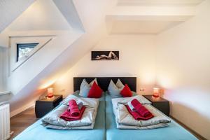 Postel nebo postele na pokoji v ubytování Im Harzer Vogelnest Meisennest