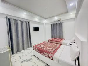 Postel nebo postele na pokoji v ubytování El Mesala Hotel