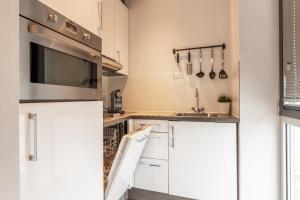 Kuchyň nebo kuchyňský kout v ubytování Hotel Lumen Zwolle