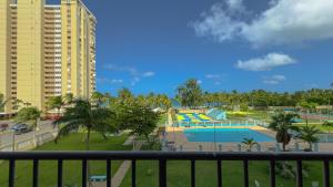 Πισίνα στο ή κοντά στο Moana's Beach Apartment in Luquillo PR Beach View