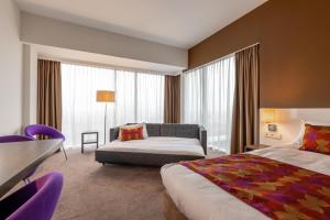 Postel nebo postele na pokoji v ubytování Hotel Lumen Zwolle + 37 fotografií