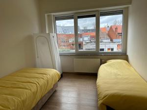 Voodi või voodid majutusasutuse Spacious Apartment next to Port of Antwerp toas