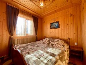 Postel nebo postele na pokoji v ubytování Goryanka family home