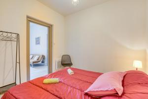 Postel nebo postele na pokoji v ubytování Appart - Sète quartier des Artistes