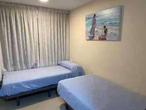 Postel nebo postele na pokoji v ubytování Miramar Seafront Levante R596