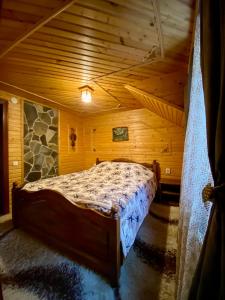 Postel nebo postele na pokoji v ubytování Goryanka family home