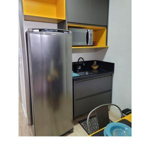 Kuchyň nebo kuchyňský kout v ubytování Flat Studio Charmoso New Studio Granja Viana Cotia