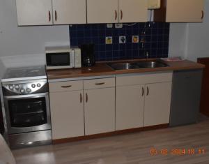 Kuchyňa alebo kuchynka v ubytovaní Trogirsunset Apartments