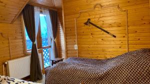 Postel nebo postele na pokoji v ubytování Goryanka family home