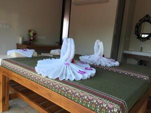 Ένα ή περισσότερα κρεβάτια σε δωμάτιο στο At Samui Boutique Hotel +28 φωτογραφίες