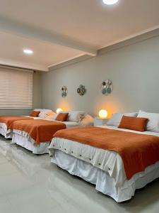 Ένα ή περισσότερα κρεβάτια σε δωμάτιο στο Alojamiento RBOY Las Mariposas