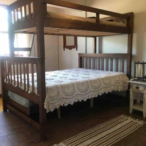 Ένα ή περισσότερα κρεβάτια σε δωμάτιο στο Belíssima e Afetuosa Casa em Juquehy