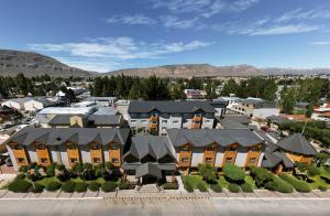 an aerial view of a city with buildings at Hotel Quijote in El Calafate