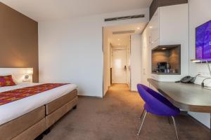 Postel nebo postele na pokoji v ubytování Hotel Lumen Zwolle