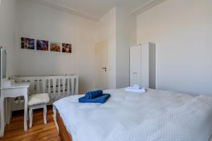 Letto o letti in una camera di Gruben Apartments 2 schlafzimmer