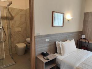 Koupelna v ubytování Hotel Romano