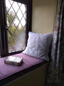Postel nebo postele na pokoji v ubytování Sylvie's Country Cottage North Devon