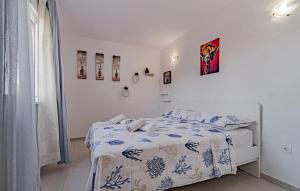 Postel nebo postele na pokoji v ubytování Studio Holiday Home In Tankaraca