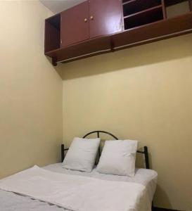 Katil atau katil-katil dalam bilik di Bohol Budget Friendly Accommodation