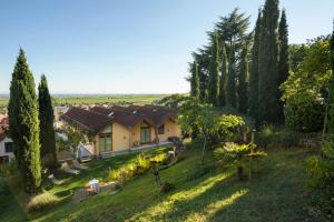 an aerial view of a house with trees at Das Palatinum in Sankt Martin