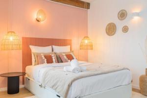 En eller flere senge i et værelse på Old Lille - Functional studio at the Quai du Wault