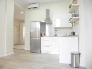 Una cocina o zona de cocina en Apartamentos Uncibay Premium